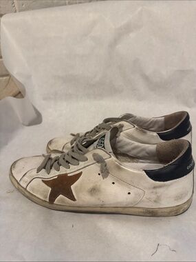 Golden Goose Off-White Leather Sneakers with Brown Star and Black Heel
Authentic